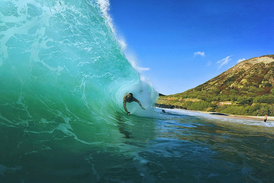 Body surfer in a wave