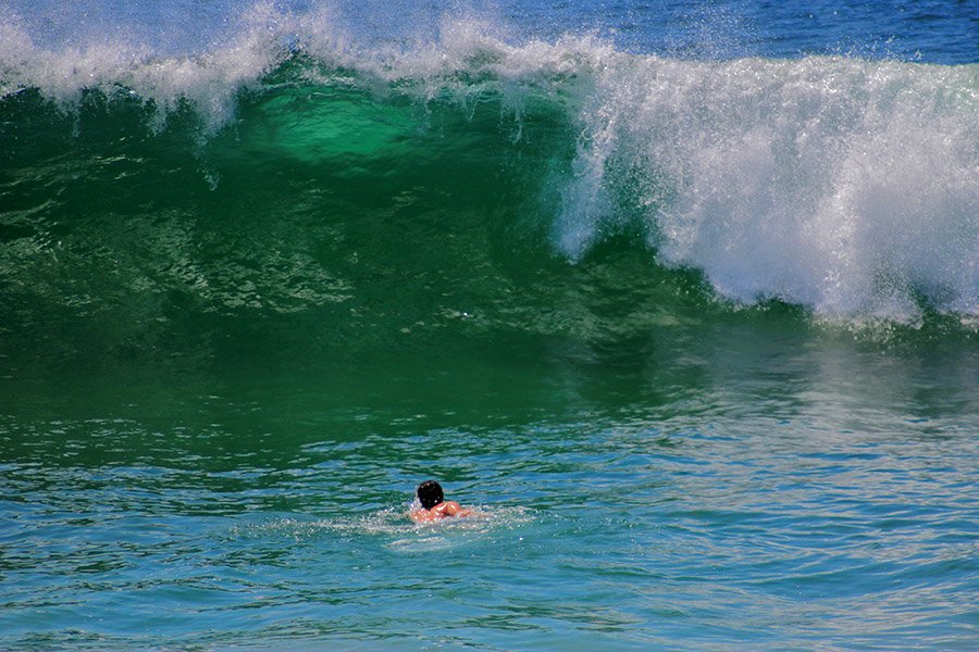 Bodysurfer approaching a wave